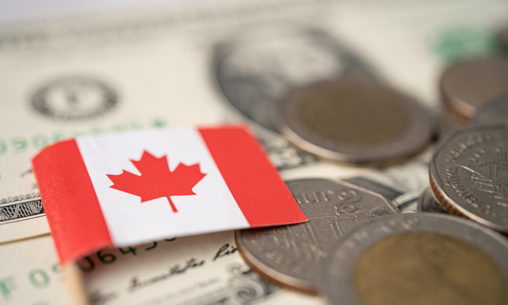 Loonie drops on Powell comments, BoC to hold today